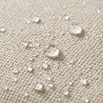 Water beading on the solution-dyed Olefin fabric of the Poolboy Floata-Round in Cloud white.