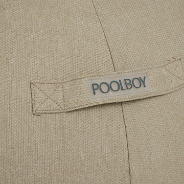 Woven Poolboy label on the Poolboy Floata-Round in Natural beige.