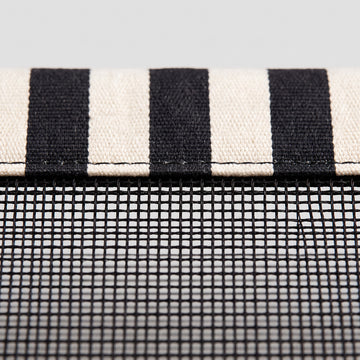 Open mesh centre of the Poolboy Sinka-Bit in Black and White stripe, water passing through.