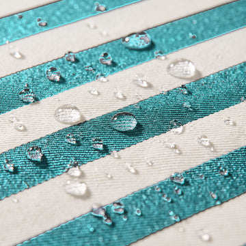 Water beading on the solution-dyed Olefin fabric of the Poolboy Sinka-Bit in Blue and White stripe.