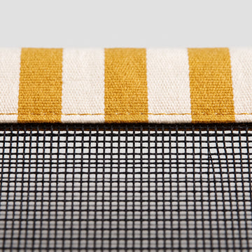 Open mesh centre of the Poolboy Sinka-Bit in Yellow and White stripe, water passing through.